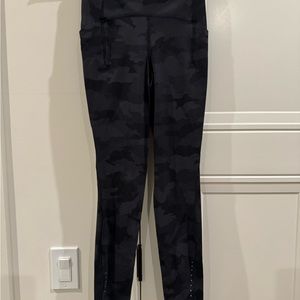 Lululemon leggings with packets, military style print size 2 used
